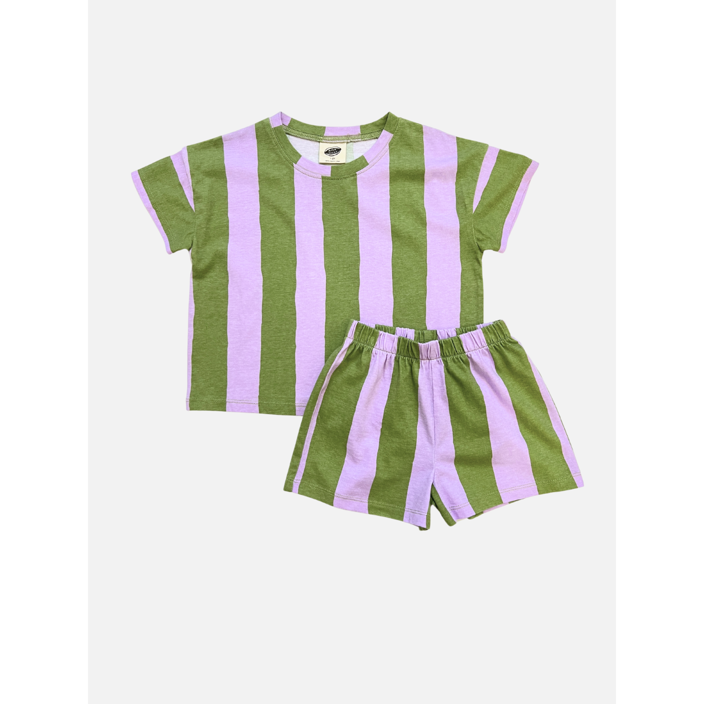 Green/Purple | The UMBRELLA STRIPE SHORT SET in Green/Purple is a unisex set with a soft organic cotton t-shirt and shorts, both featuring wide vertical stripes. This matching play set is shown on a plain white background.