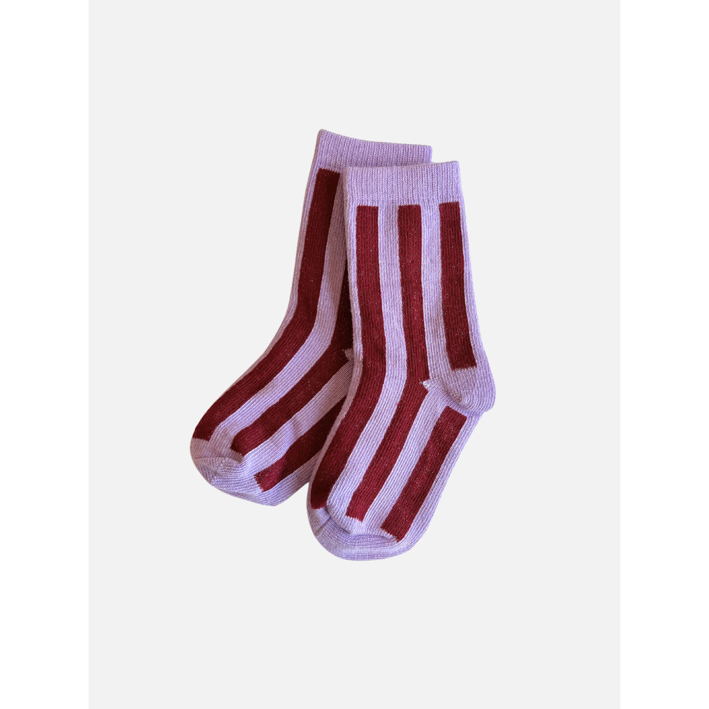 Violet | Introducing the STRIPE SOCK: A pair of light violet, stretchy cotton socks featuring dark red vertical stripes for that comfy, stripy look.