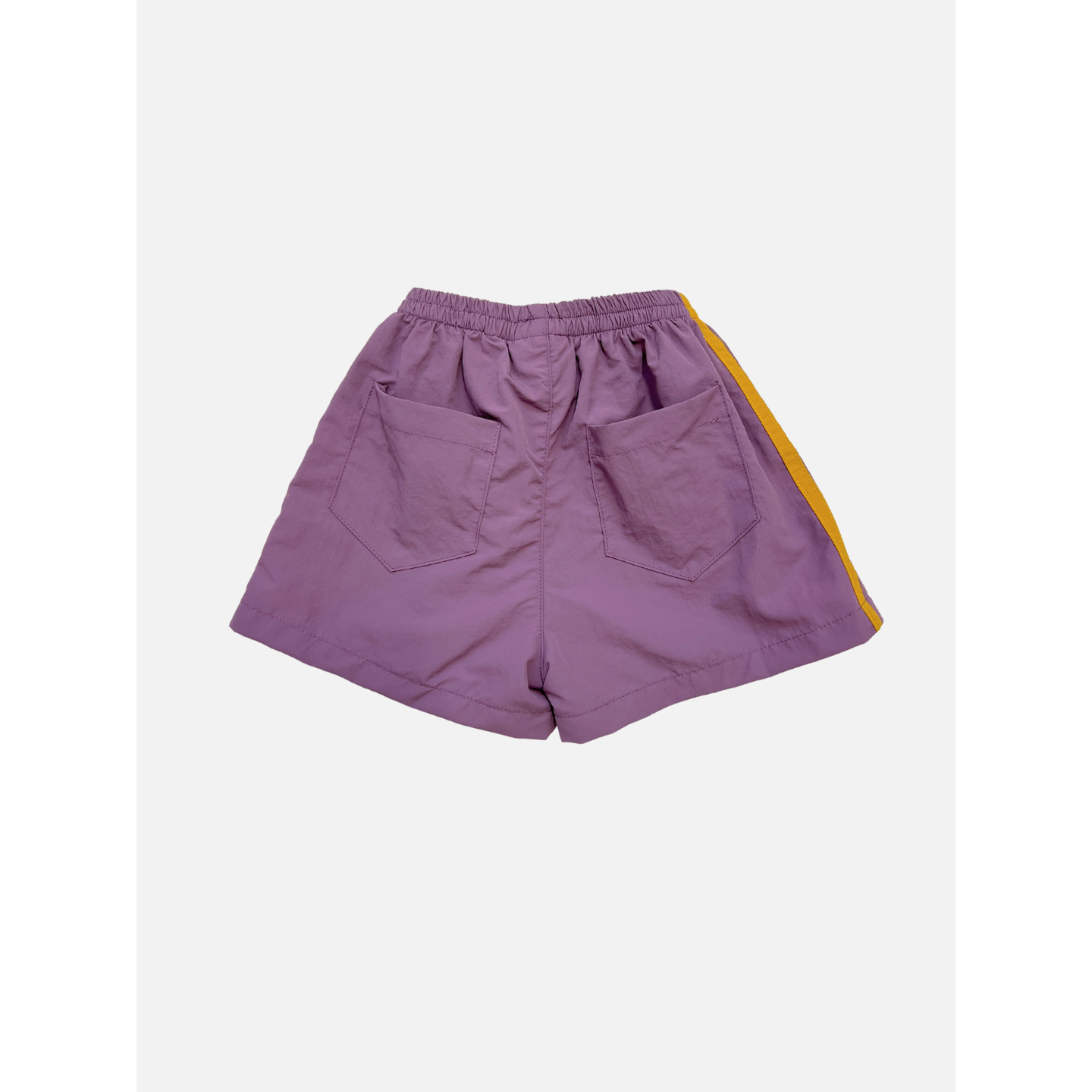 Purple | SPRINTER SHORTS in purple with an elasticated waist, two back pockets, and a yellow side stripe are displayed on a plain white background.