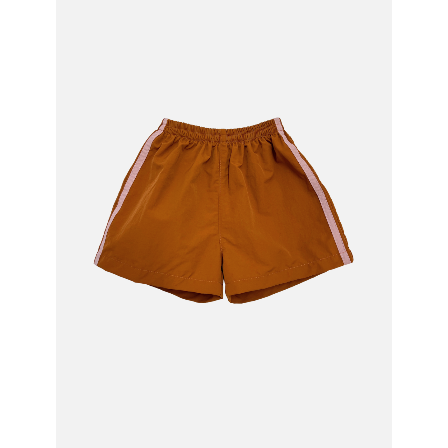 Rust | SPRINTER SHORTS in rust with an elasticated waist and light pink side stripes, made from performance fabric, displayed flat on a white background.